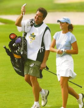 Brandi Jackson with Vince Gill as caddy