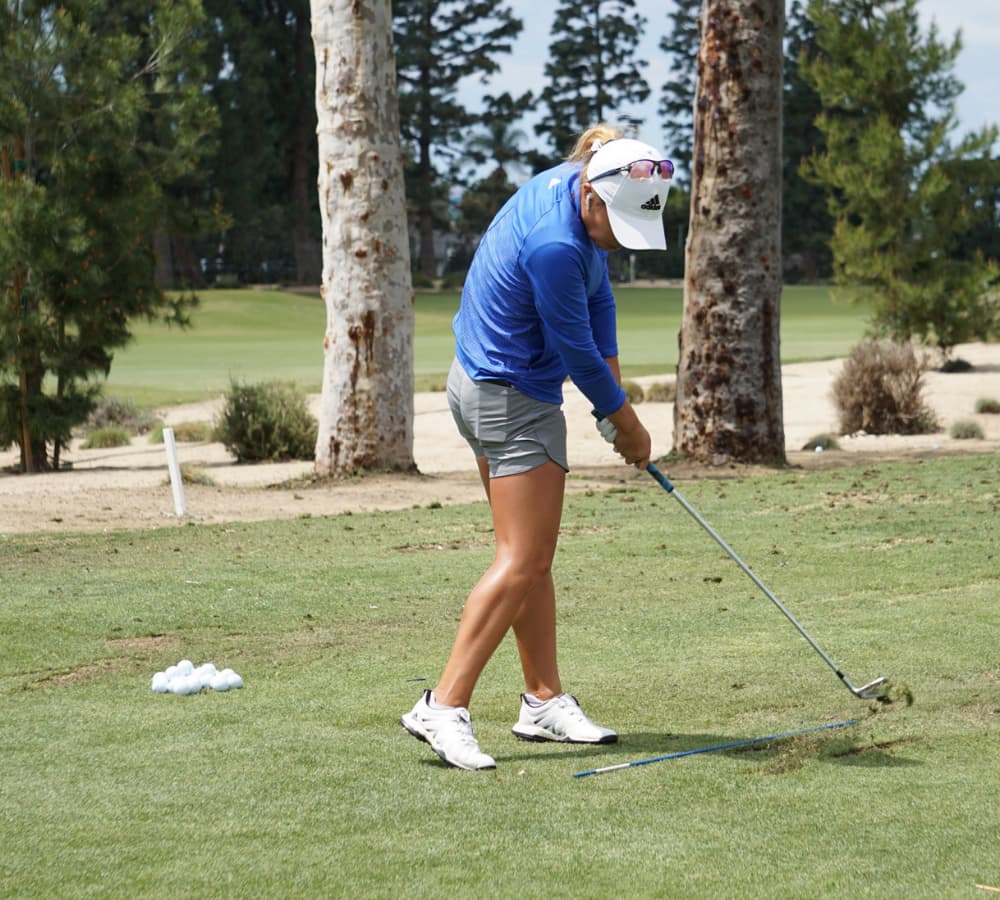 Danielle Kang on the range - - Deliberate Practice - Photo by Ben Harpring for WomensGolf.com