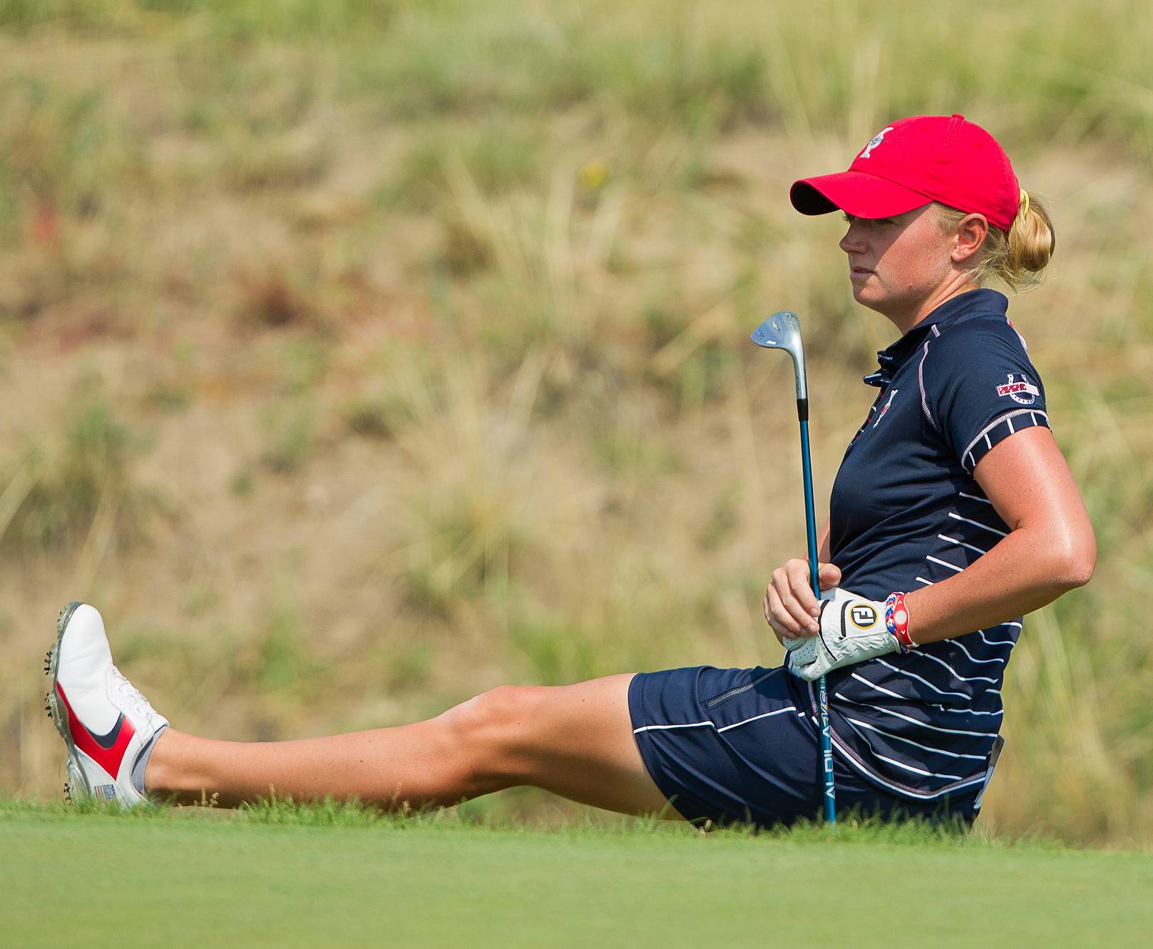Stacey Lewis of the USA reacts to a chip shot shaving the hole 
16/08/2013. Ladies European Tour. The Solheim Cup, Colorado Golf Club, Parker, Colorado, USA. 16-18 Aug 2013. Stacey Lewis of the USA reacts to a chip shot shaving the hole during the Friday morning Foursomes. Credit: Tristan Jones